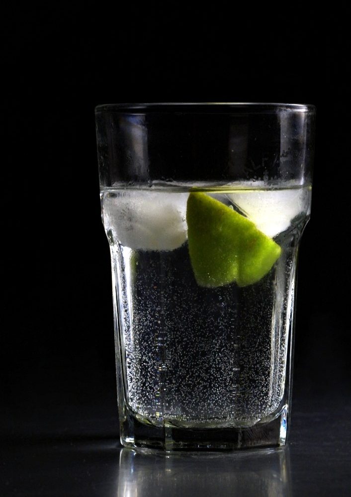 Blue Hour Fizz — Elderflower, lemon, and soda over a long pour — the session cocktail we build for a second and third round.